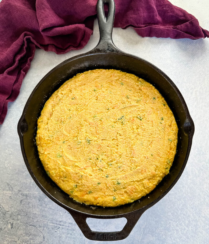 jalapeno cornbread batter in a cast iron skillet