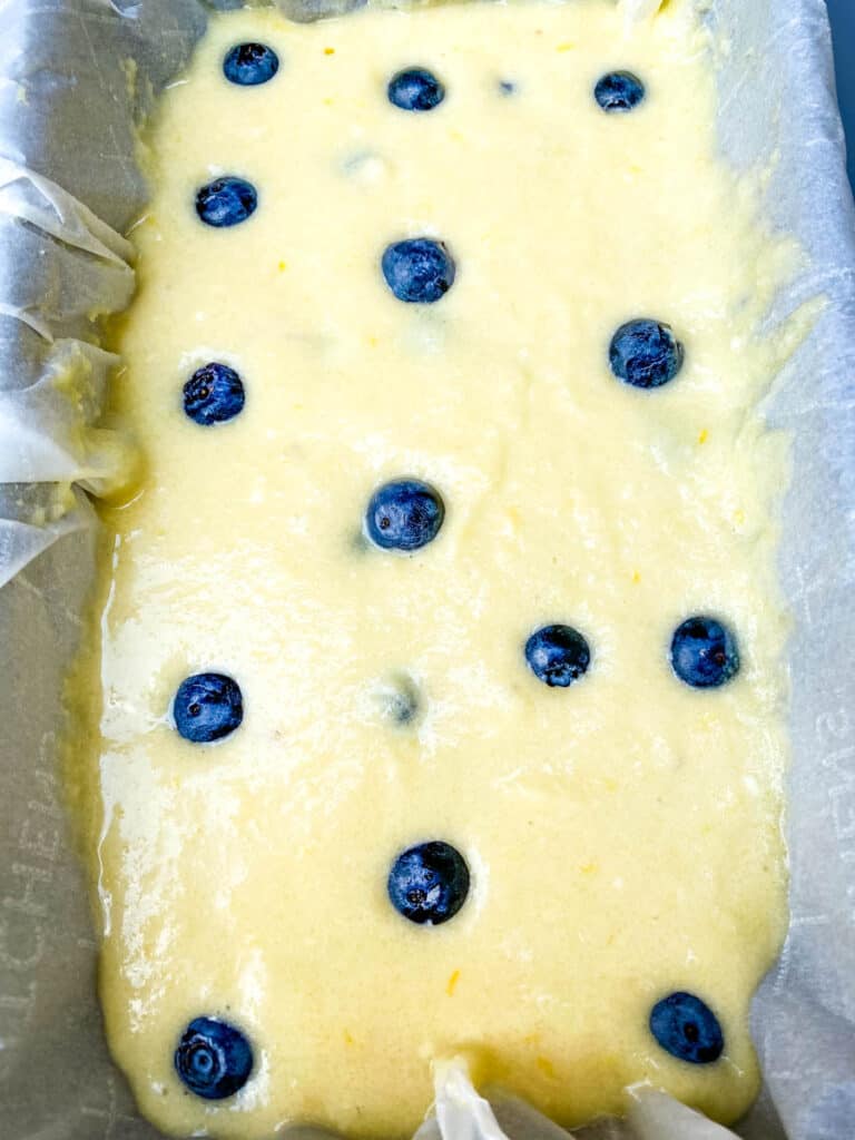 keto lemon blueberry bread batter in a loaf pan