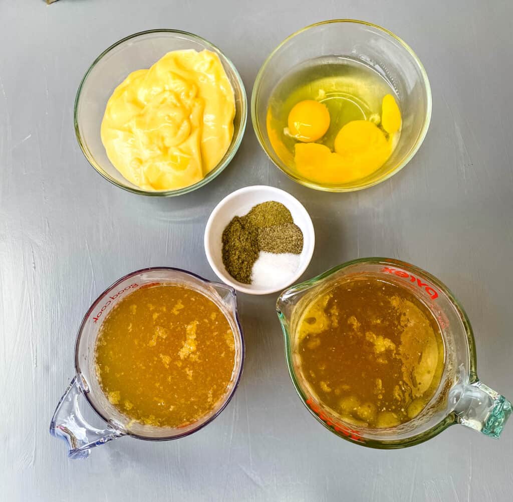 cream of chicken soup, raw eggs, chicken broth, sage, and poultry seasoning in separate bowls