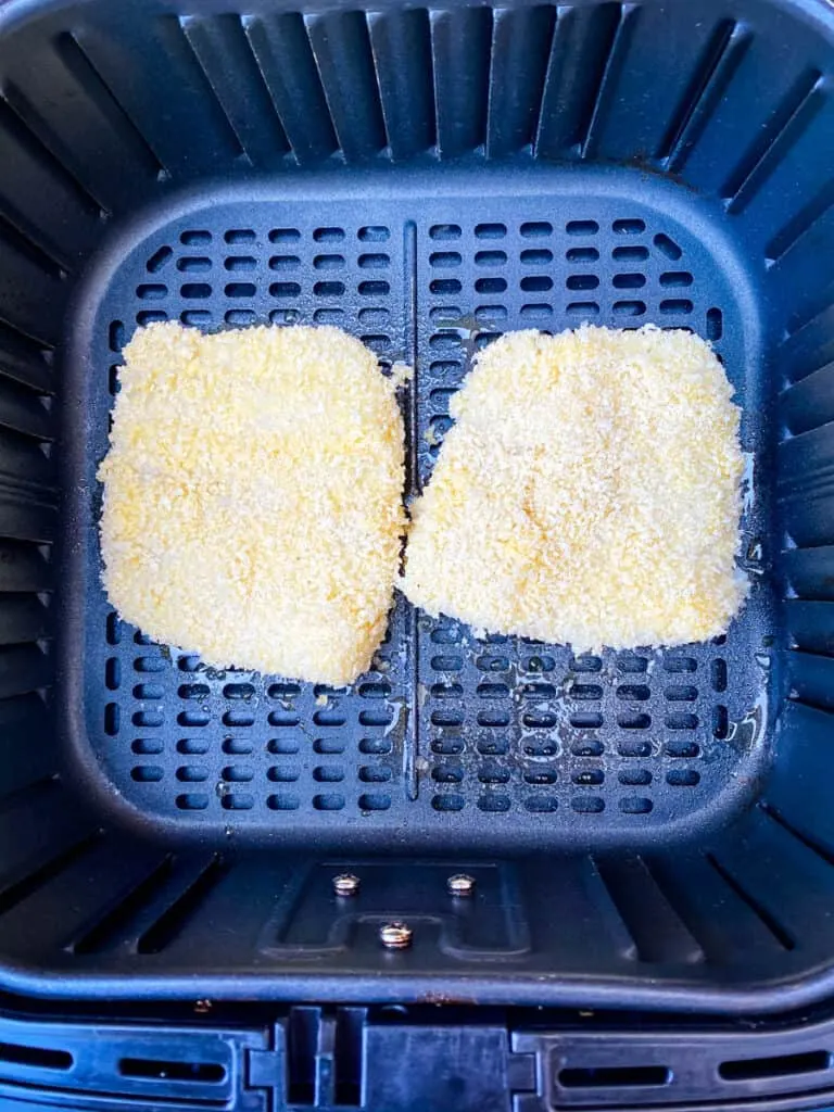 uncooked fish fillets in the air fryer