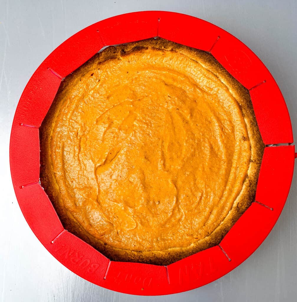 healthy sweet potato pie recipe with pie protectors around the rim of the pan