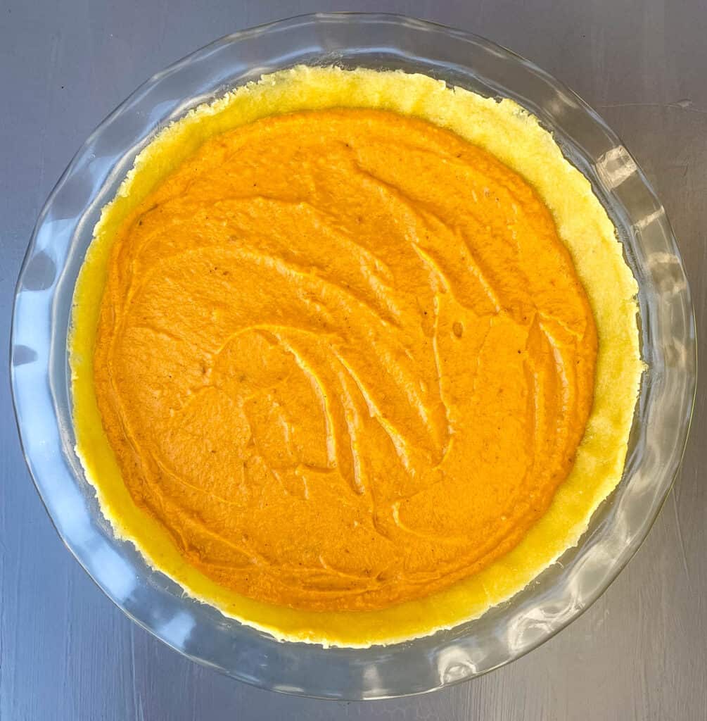 unbaked sweet potato pie on flat surface