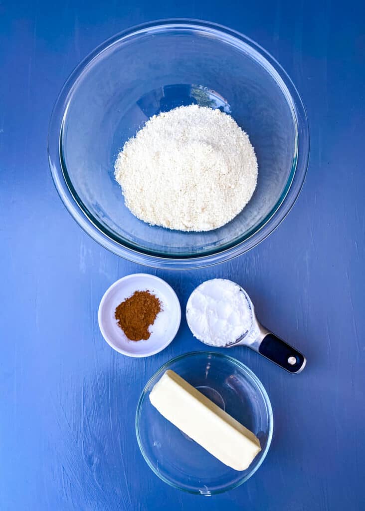 almond flour, cinnamon, butter, and Greek yogurt in separate bowls