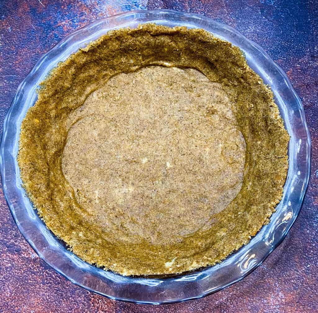 low carb graham cracker pie crust in a pan