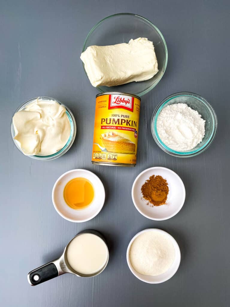 cream cheese, whipped topping, powdered sweetener, pure canned pumpkin, and pumpkin pie spice in separate bowls