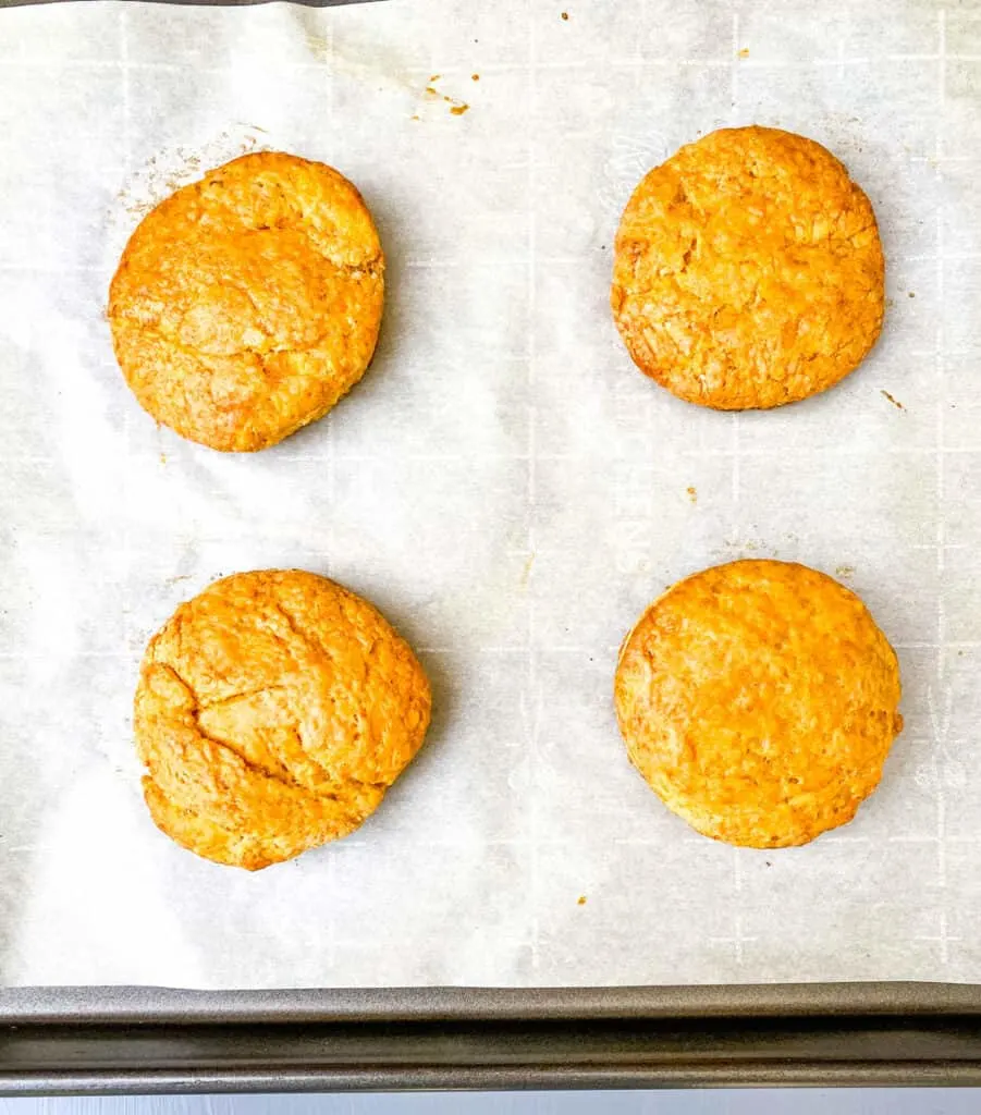 baked sweet potato biscuits on a sheet pan