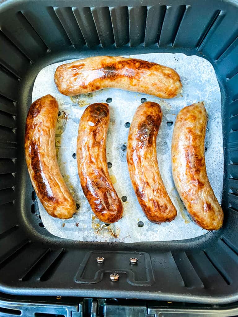 cooked brats in an air fryer