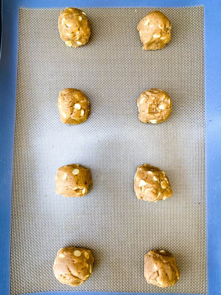 keto gingersnap cookies unbaked on a cookie sheet