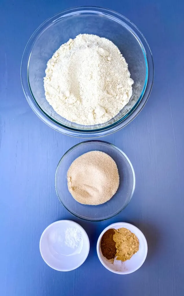 almond flour, golden sweetener, cinnamon, and baking powder in separate bowls