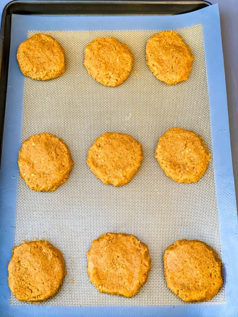 baked keto pumpkin cookies on a cookie sheet
