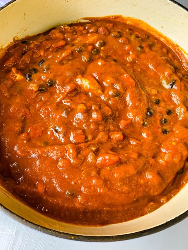 pumpkin chicken chili in a Dutch oven