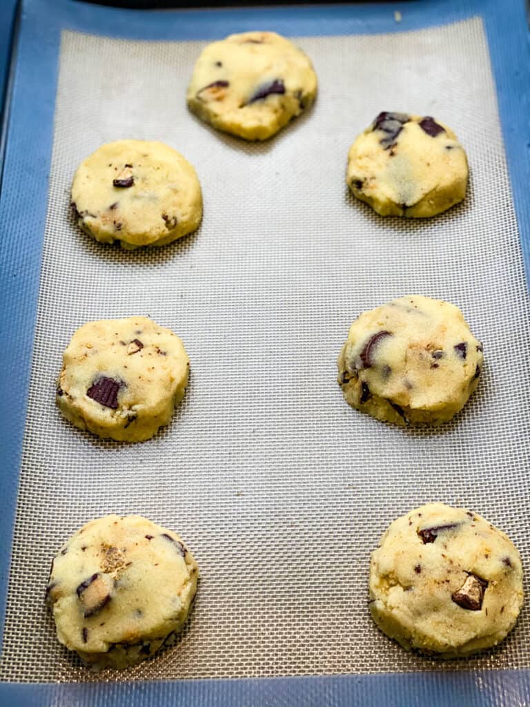 keto low carb peanut butter cup cookies on a sheet pan
