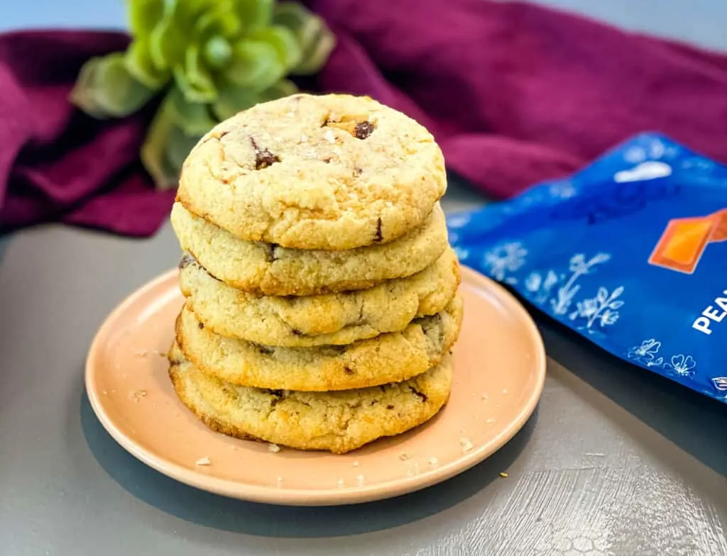 a stack of keto low carb peanut butter cup cookies on a pink plate