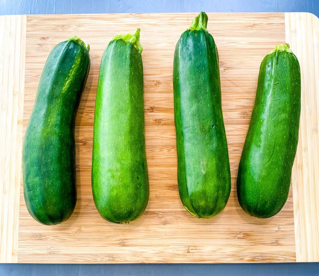 raw zucchini on a cutting board