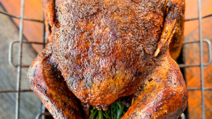 cajun roasted turkey in a roasting pan