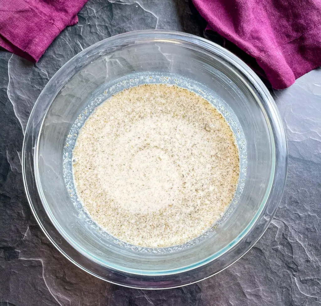 milk, flour, and seasonings in a glass bowl