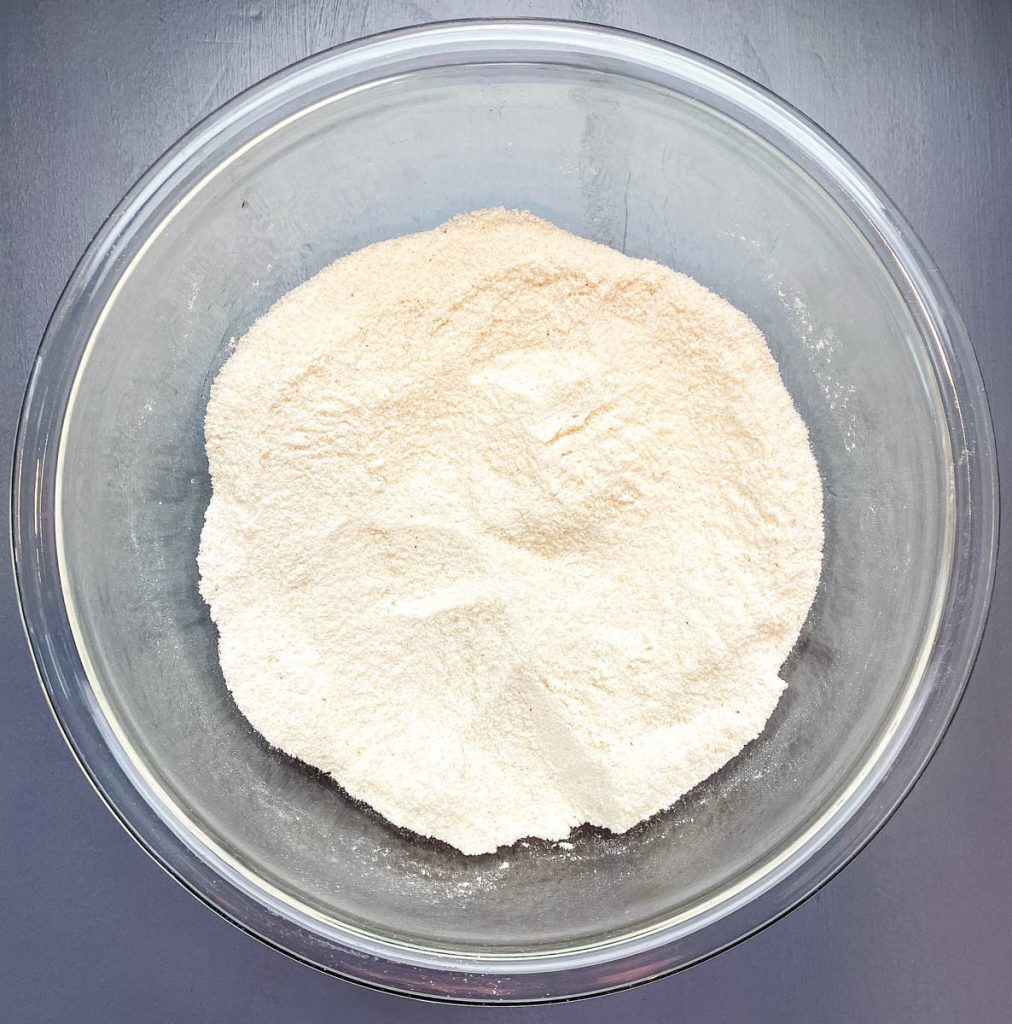 self rising cornmeal mix in a glass bowl