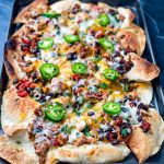 turkey nachos on a sheet pan