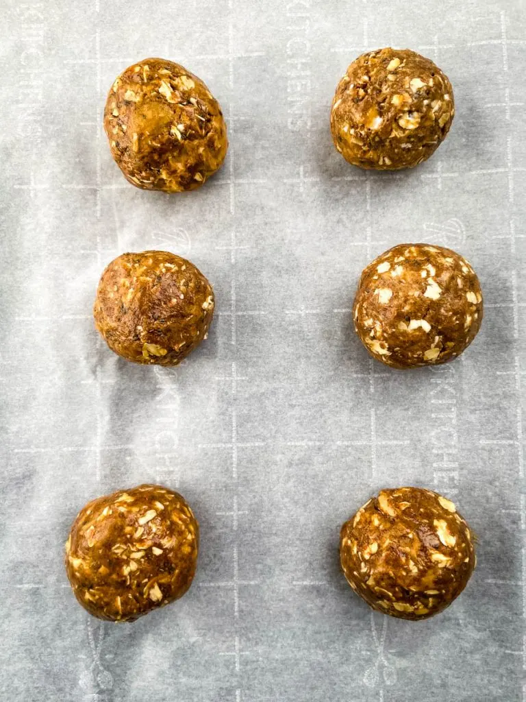 almond butter protein balls on parchment paper