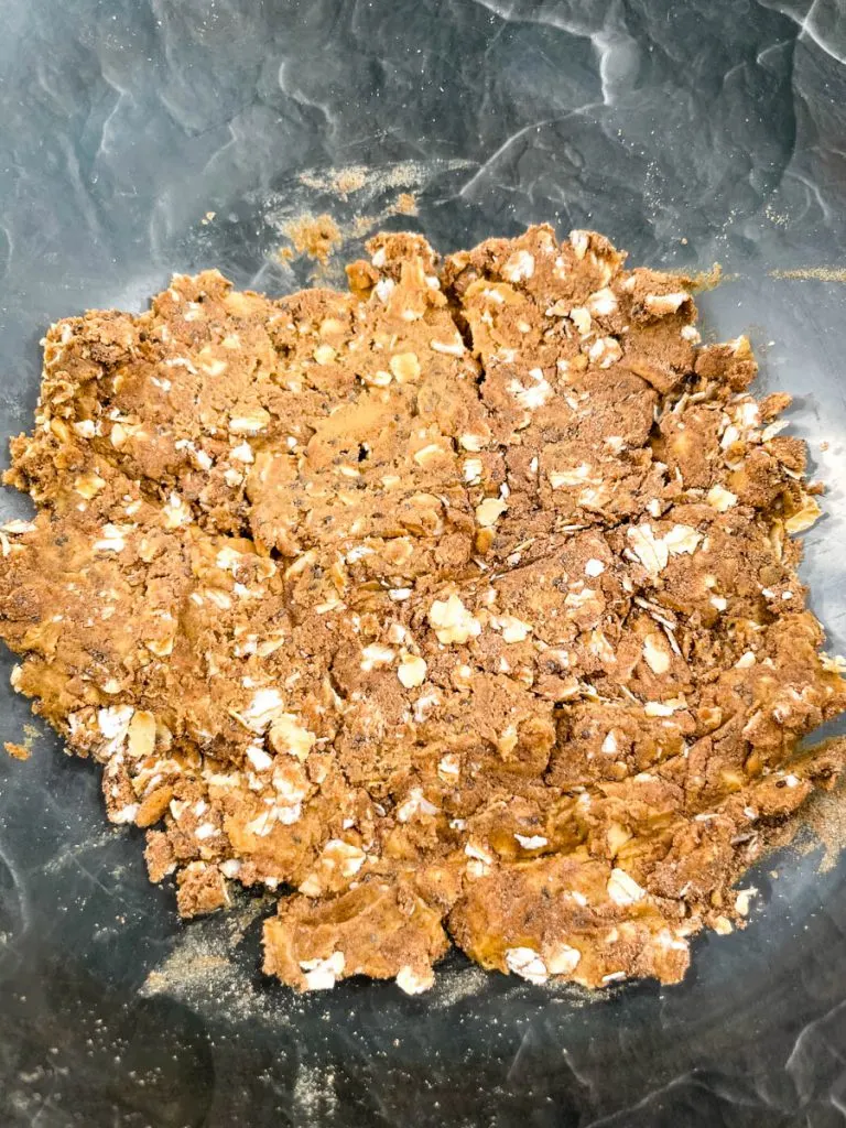 almond butter protein ball mix in a glass bowl