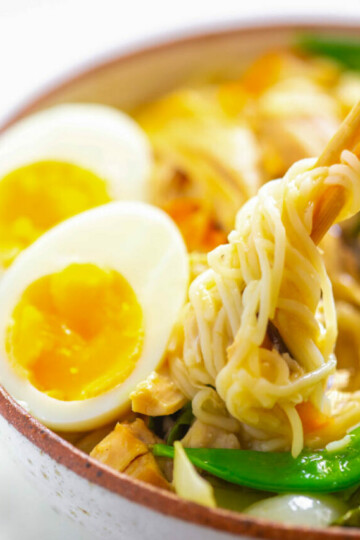 Instant Pot chicken ramen in chopsticks
