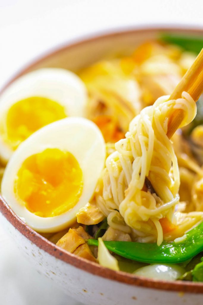 Instant Pot chicken ramen in chopsticks