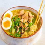 Instant Pot chicken ramen in a bowl with chopsticks