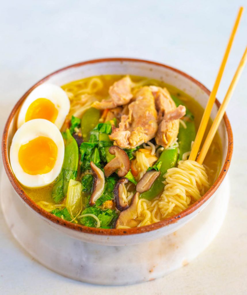 Instant Pot chicken ramen in a bowl with chopsticks