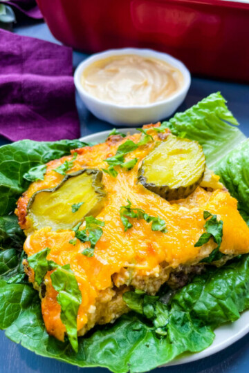 a slice of Big Mac Casserole on a bed of lettuce with Big Mac Sauce