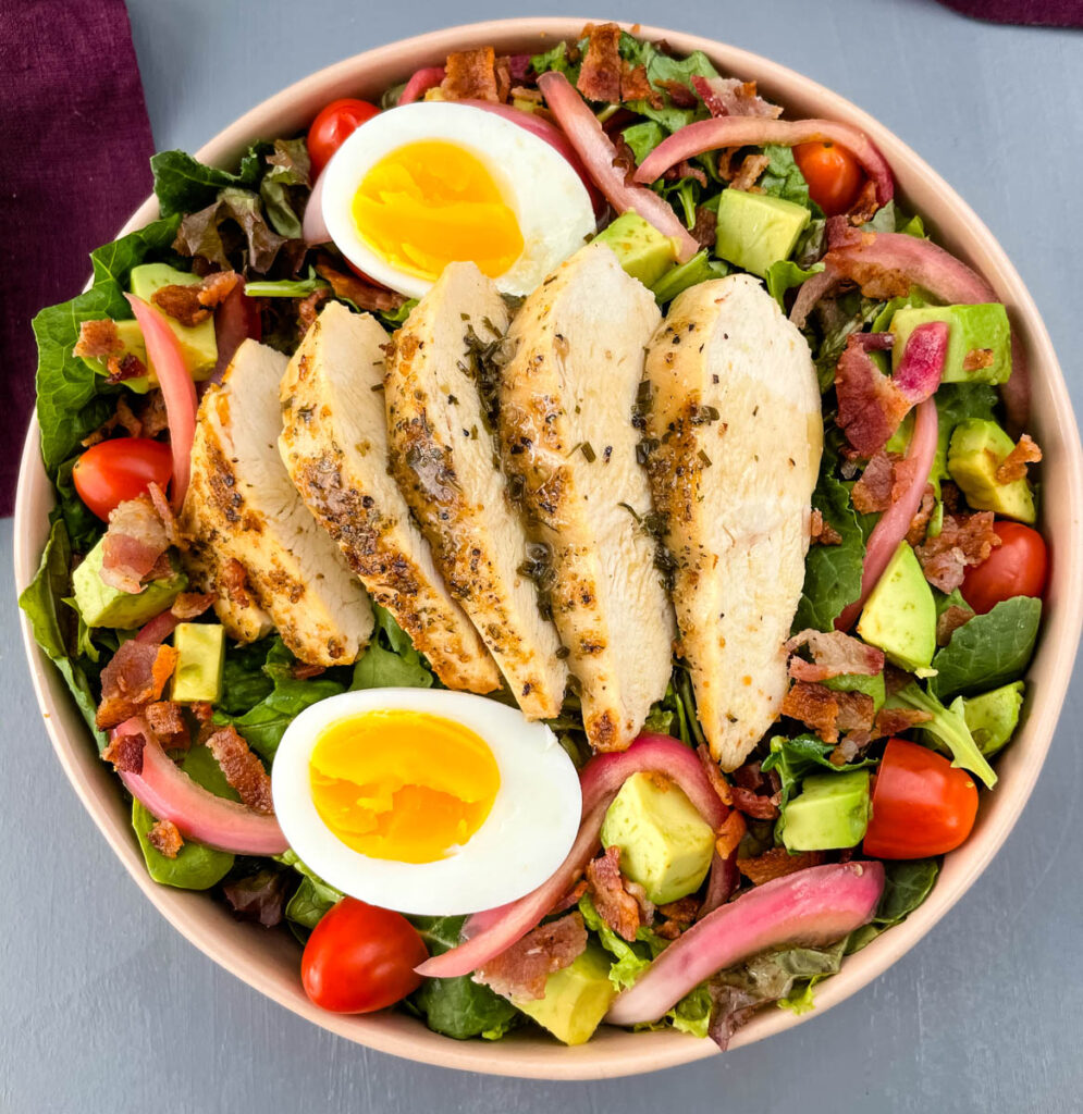 green goddess cobb salad in a bowl with eggs