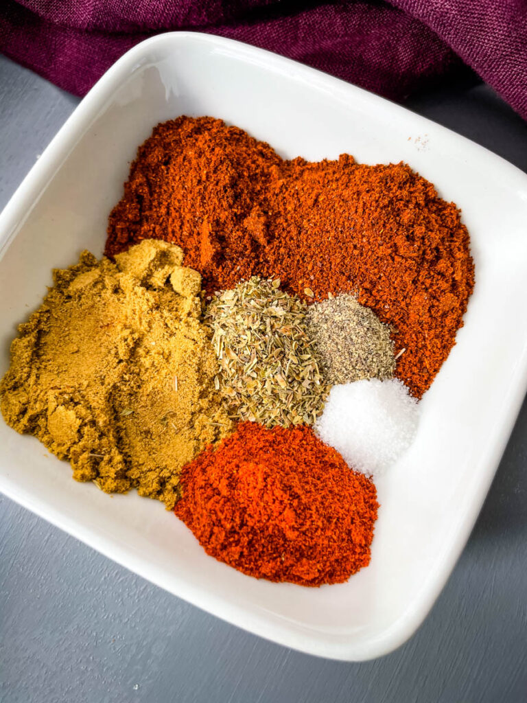 homemade chili seasoning in a white bowl