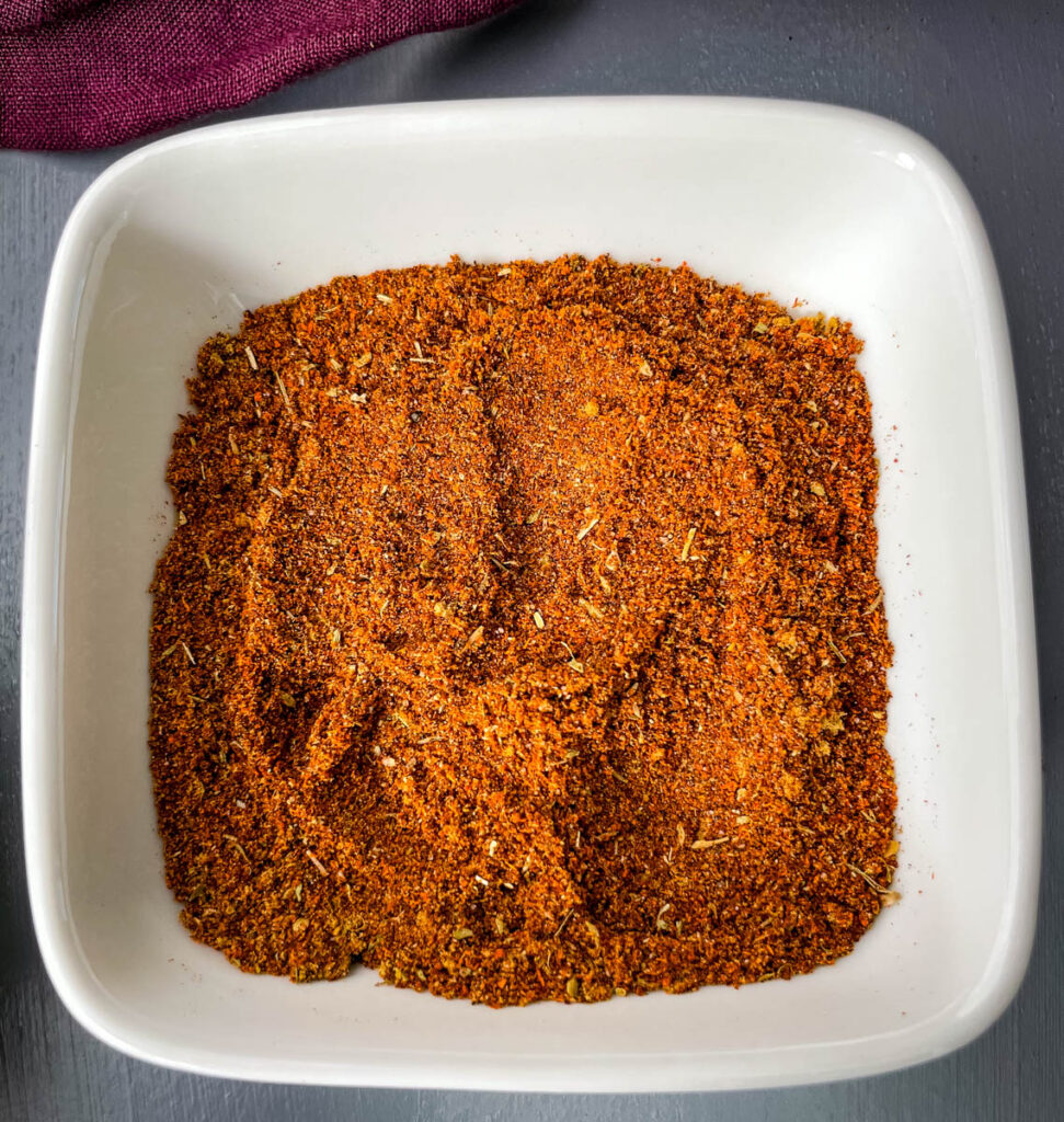 homemade chili seasoning in a white bowl