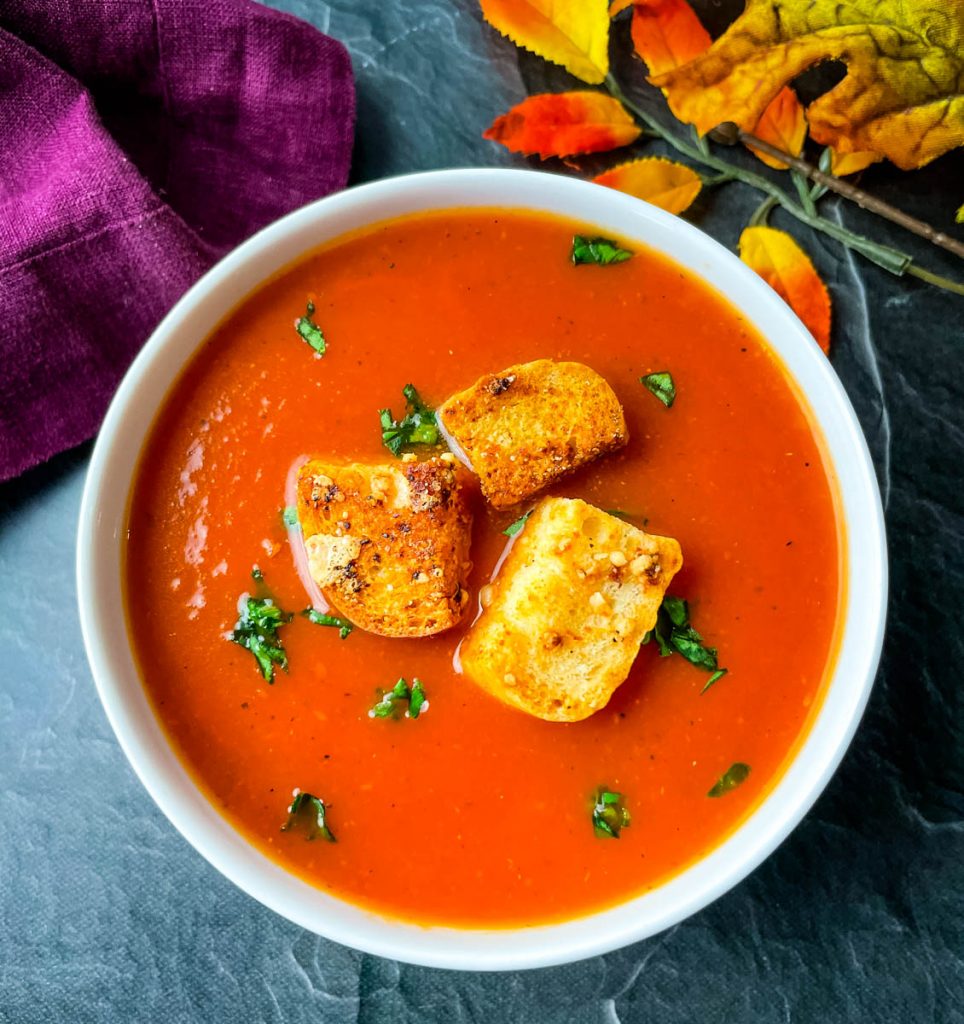 Instant Pot tomato soup in a white bowl