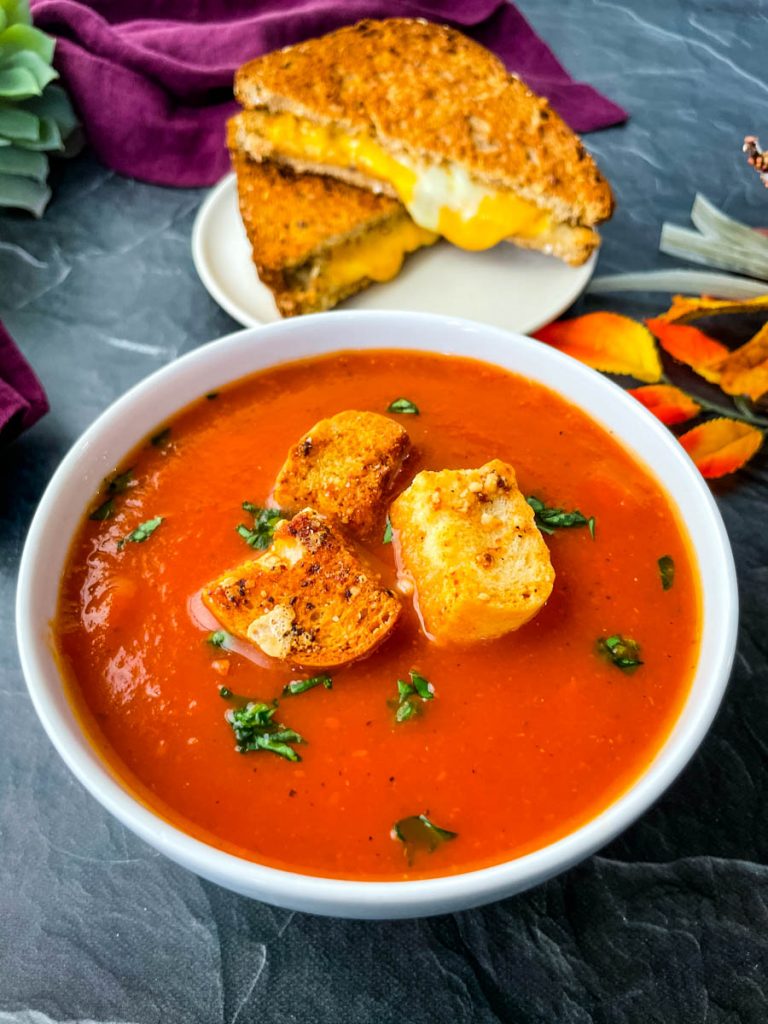 Instant Pot tomato soup in a white bowl