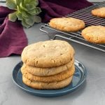 keto macadamia nut cookies stacked on a plate