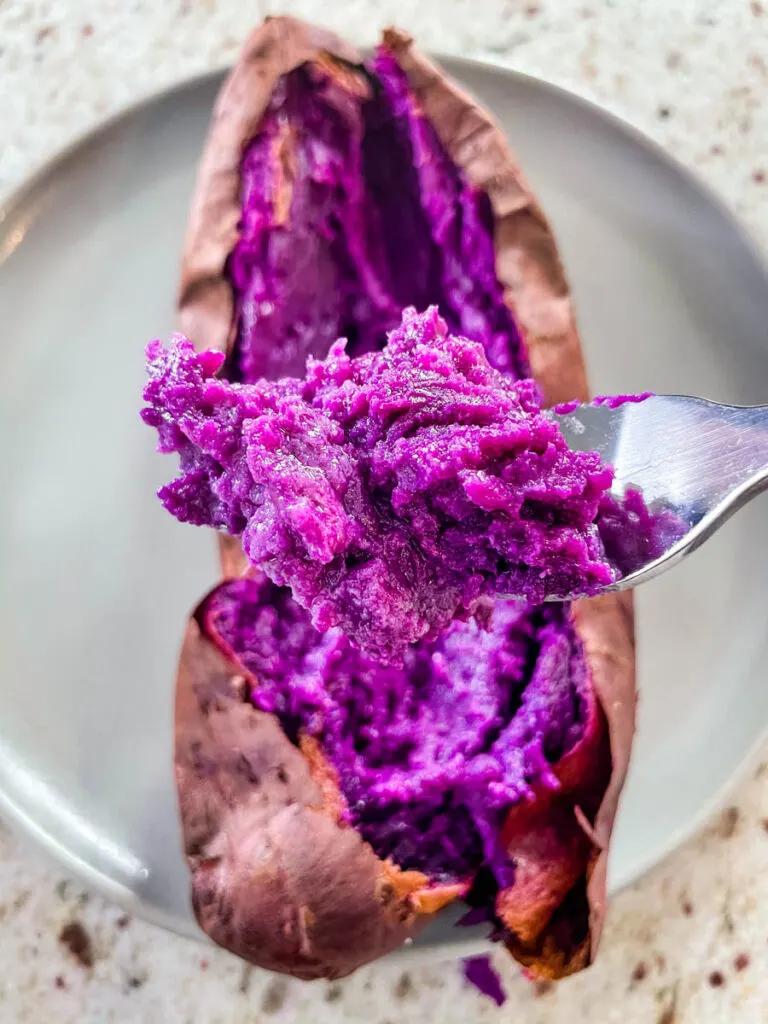 a spoonful of fully cooked Stokes purple sweet potato