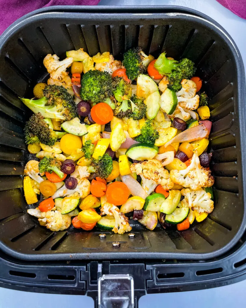 squash, zucchini, onions, carrots, broccoli, and cauliflower in an air fryer