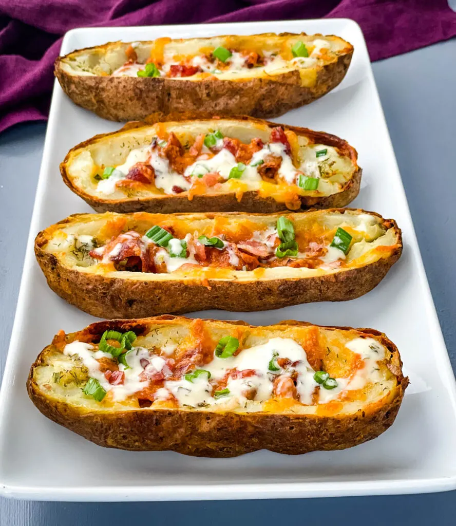 air fryer potato skins drizzled in ranch