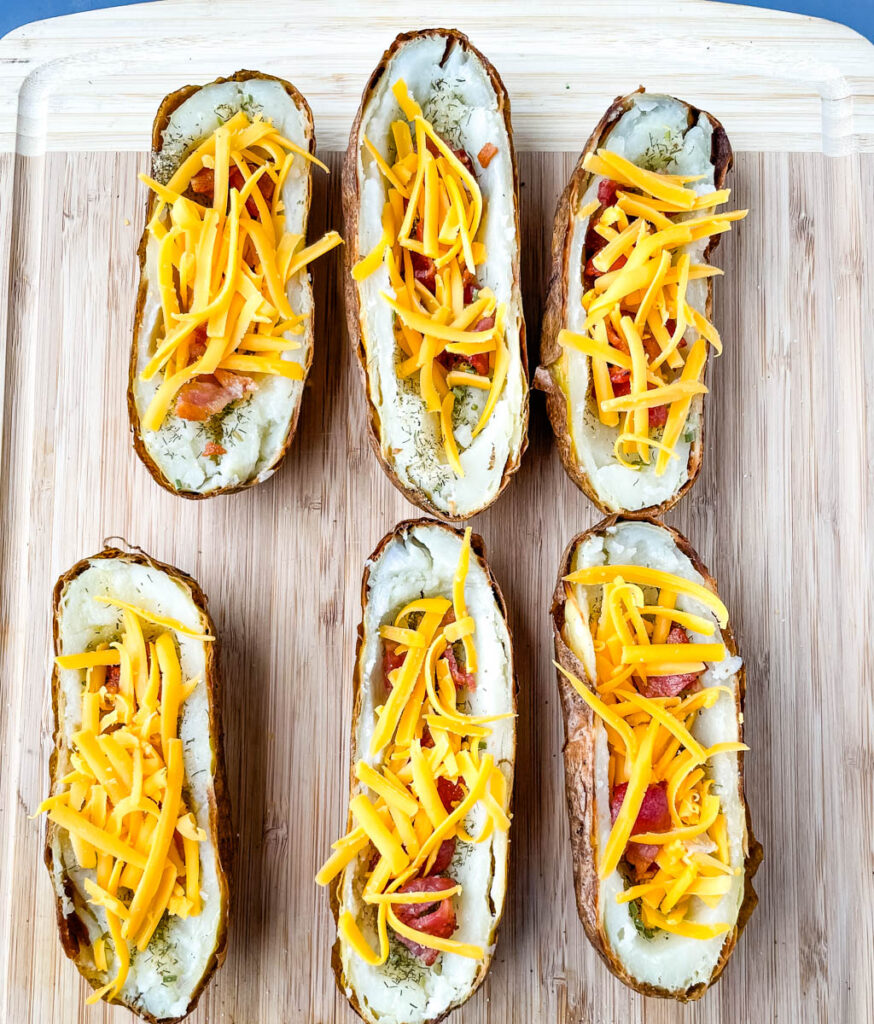 potato skins on a bamboo cutting board