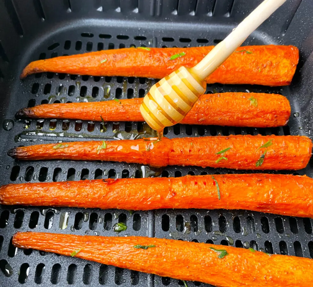 roasted carrots in an air fryer glazed with honey