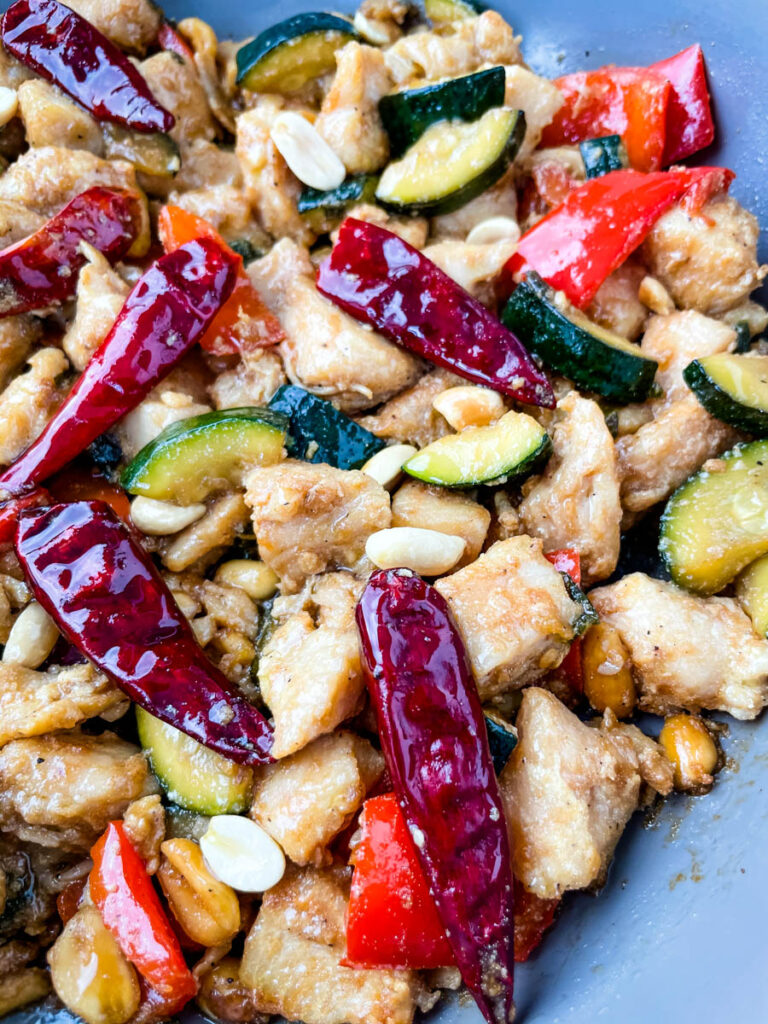 Panda Express copycat kung pao chicken on a skillet pan