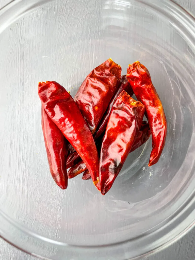 dried chili peppers in a glass bowl