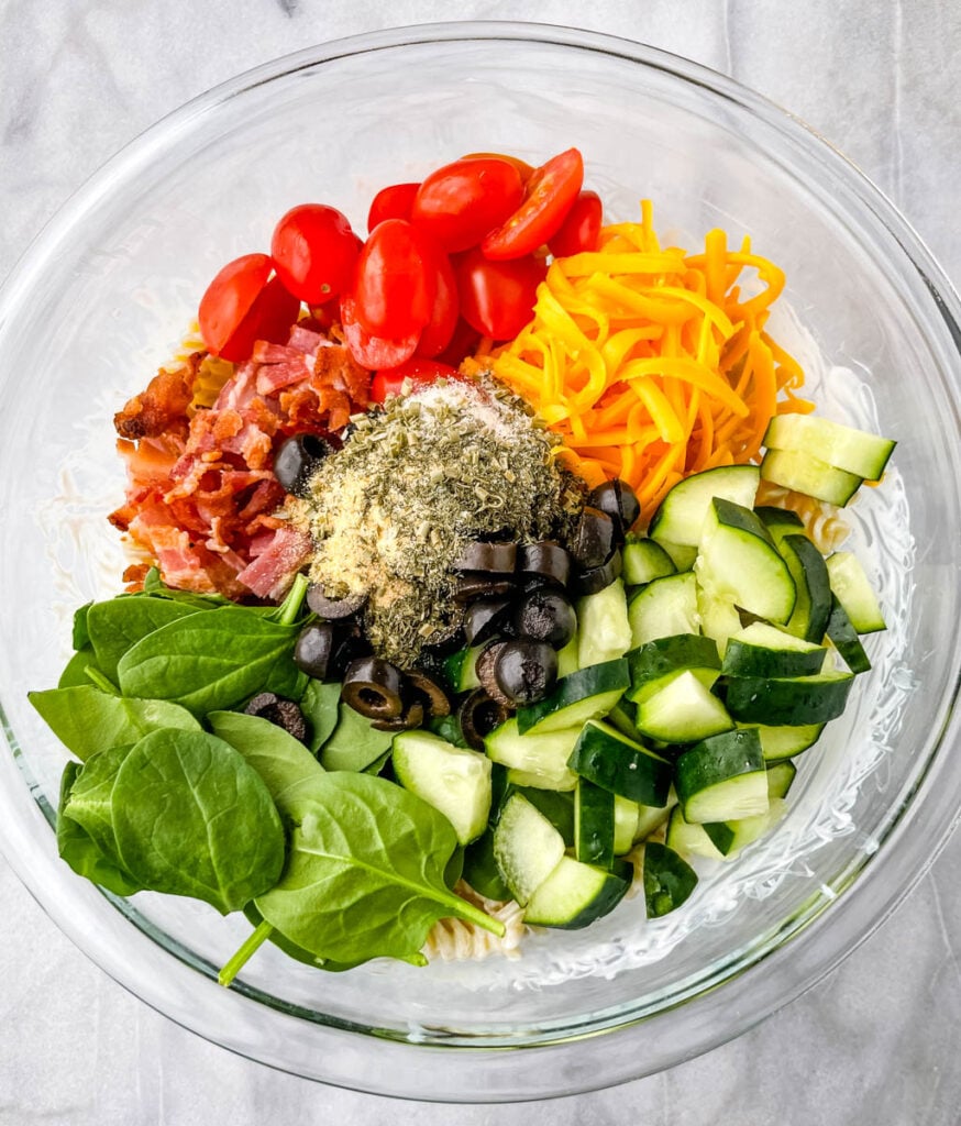 bacon ranch pasta salad in a glass bowl