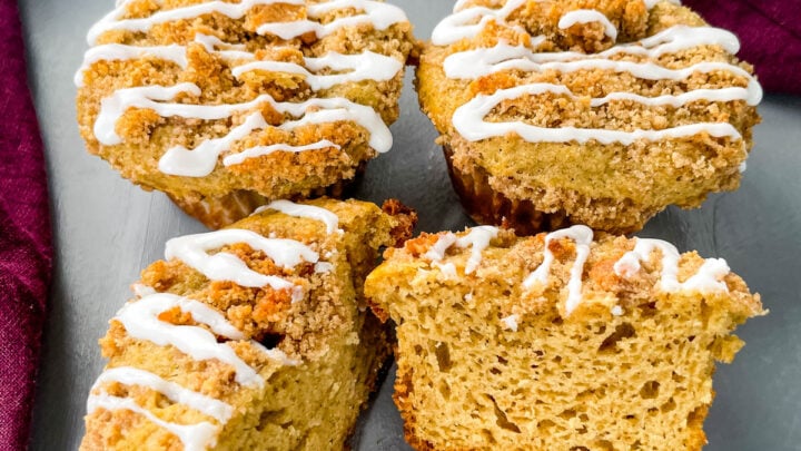 coffee cake muffins with icing on a flat surface