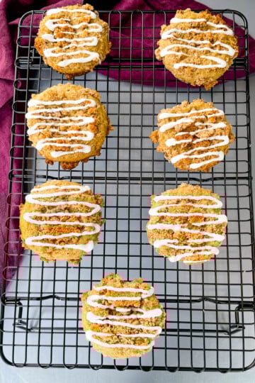 coffee cake muffins with icing on a cooling rack