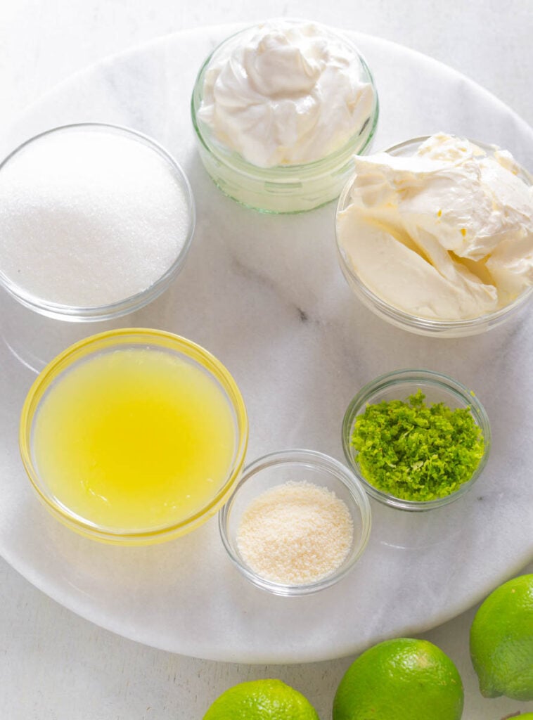 sweetener, key lime juice, Greek yogurt, cream cheese, and lime zest in separate bowls