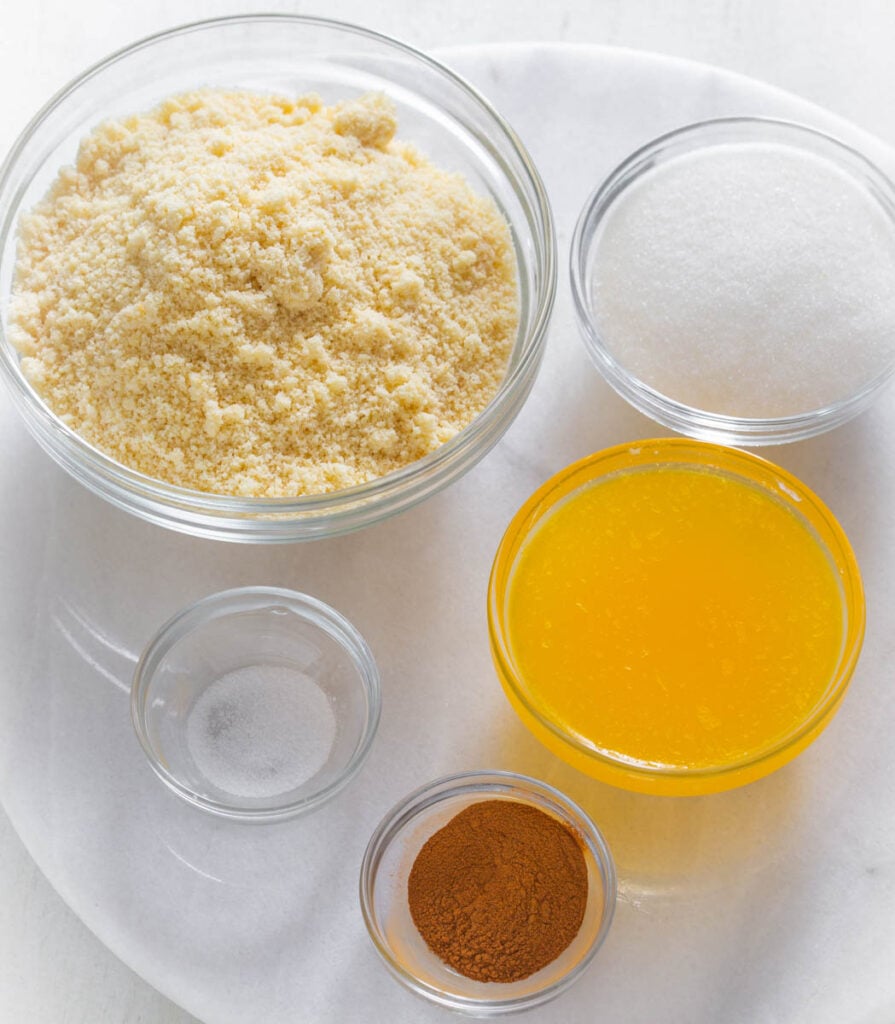 almond flour, sweetener, butter, cinnamon, and salt in separate bowls