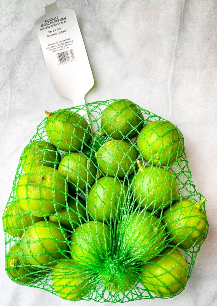 fresh key limes in a bag