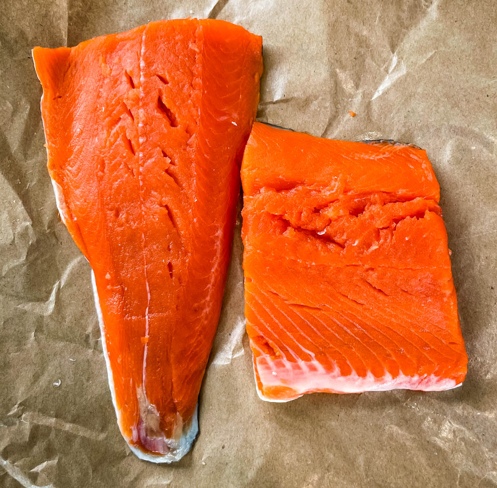 raw wild caught salmon on paper