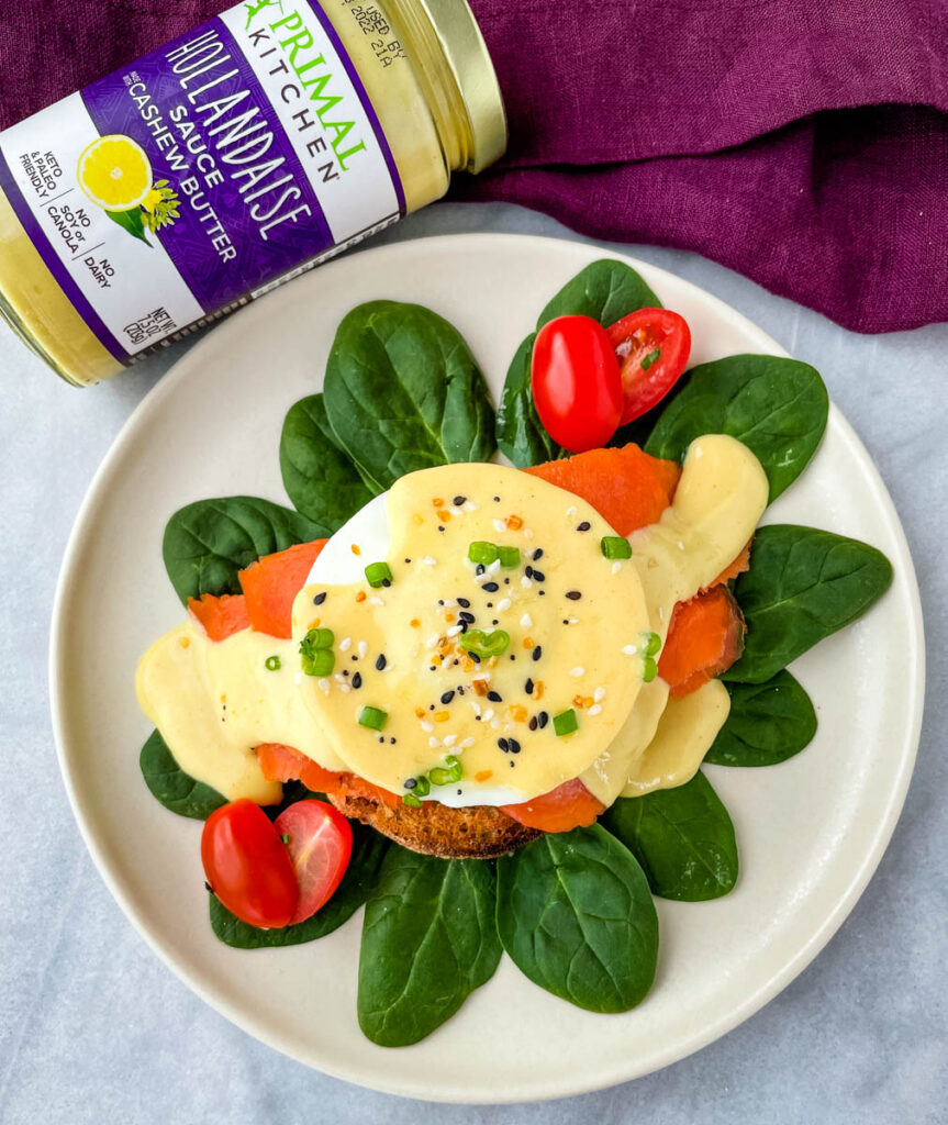 smoked salmon eggs Benedict on a bed of spinach